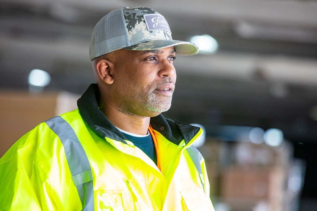 Jones Logistics warehousing/distribution services employee looks out at open dock.