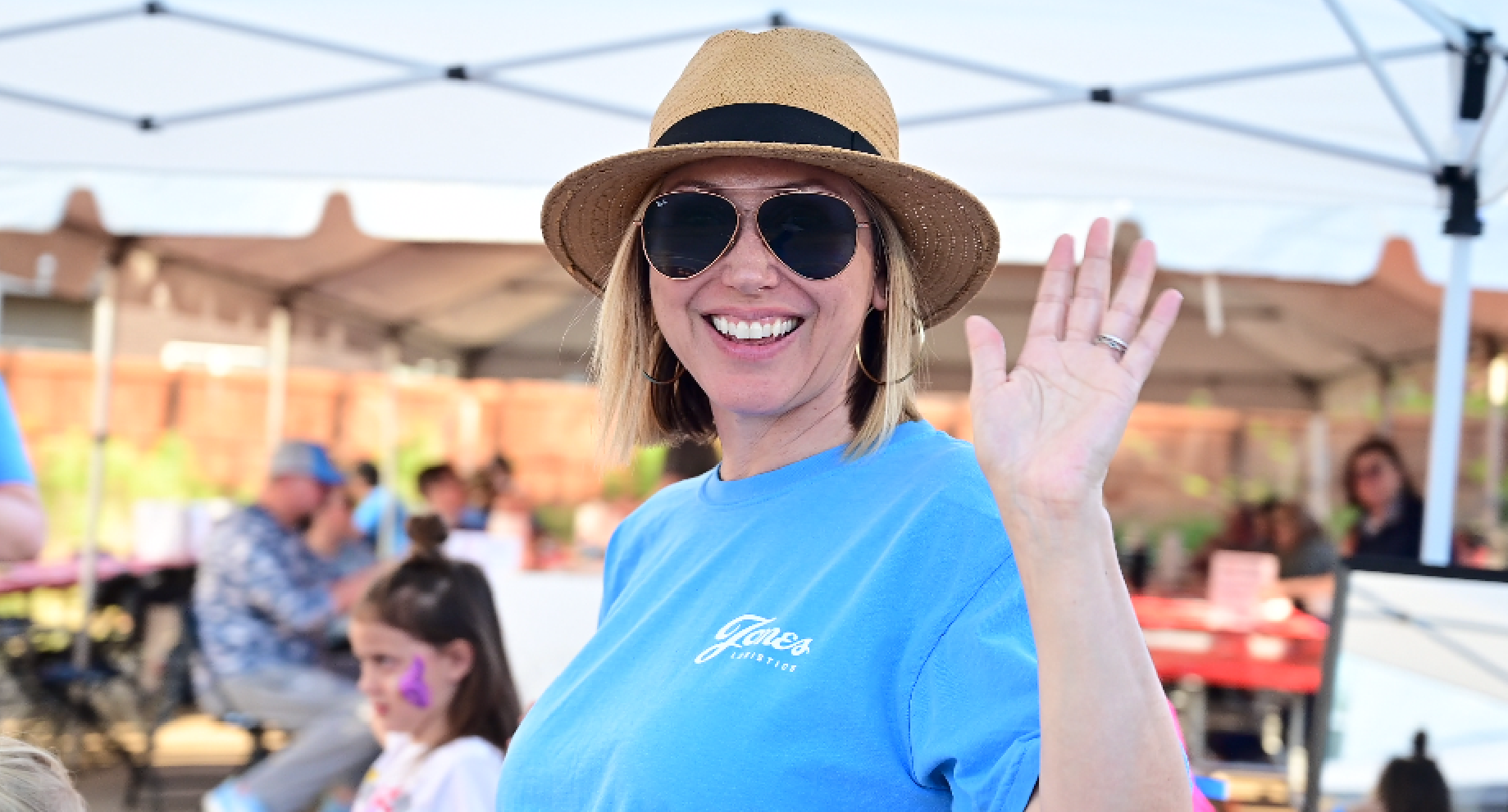 Trina McAlister waves at the camera during JoLo's annual Claws for a Cause event.