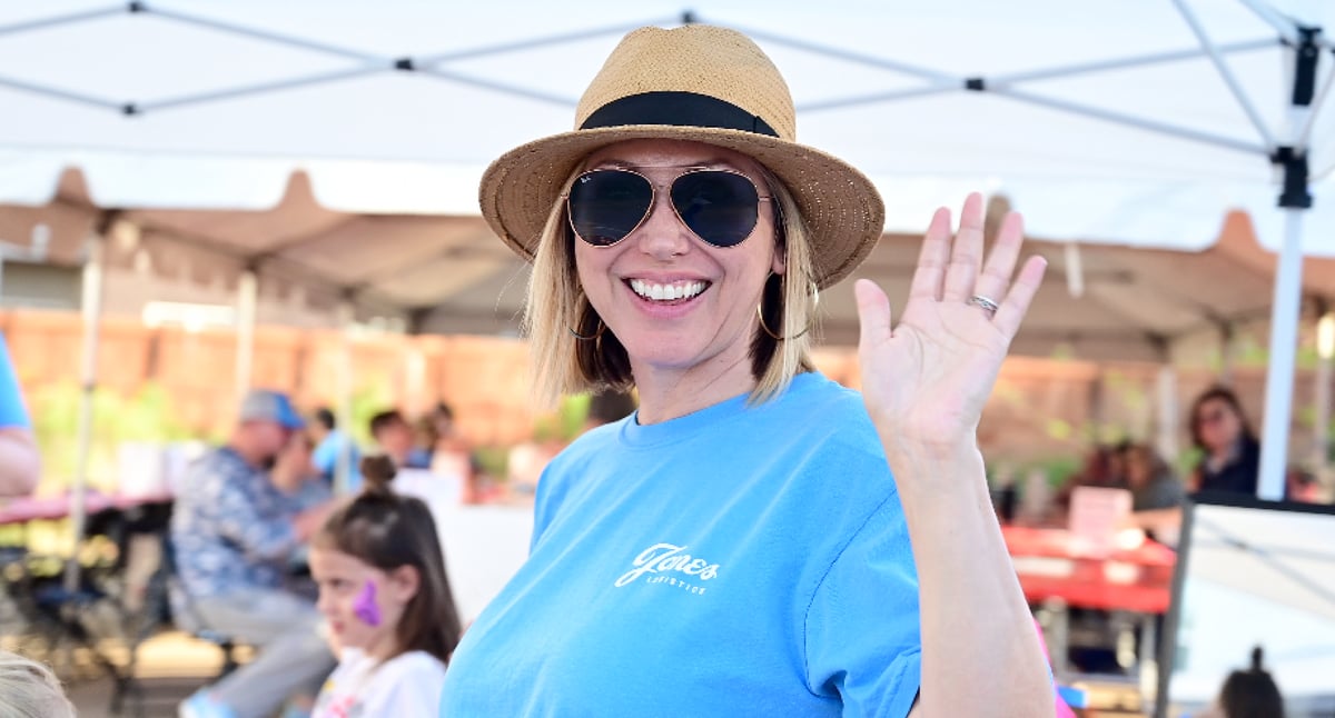 Trina McAlister waves at the camera during JoLo's annual Claws for a Cause event.